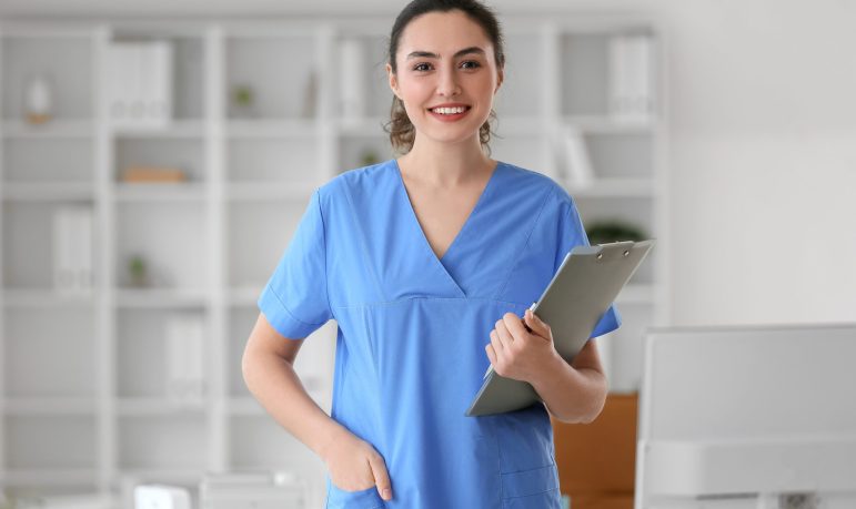 Female,Medical,Assistant,With,Clipboard,In,Clinic